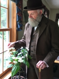 Kenneth Noll portraying Charles Darwin